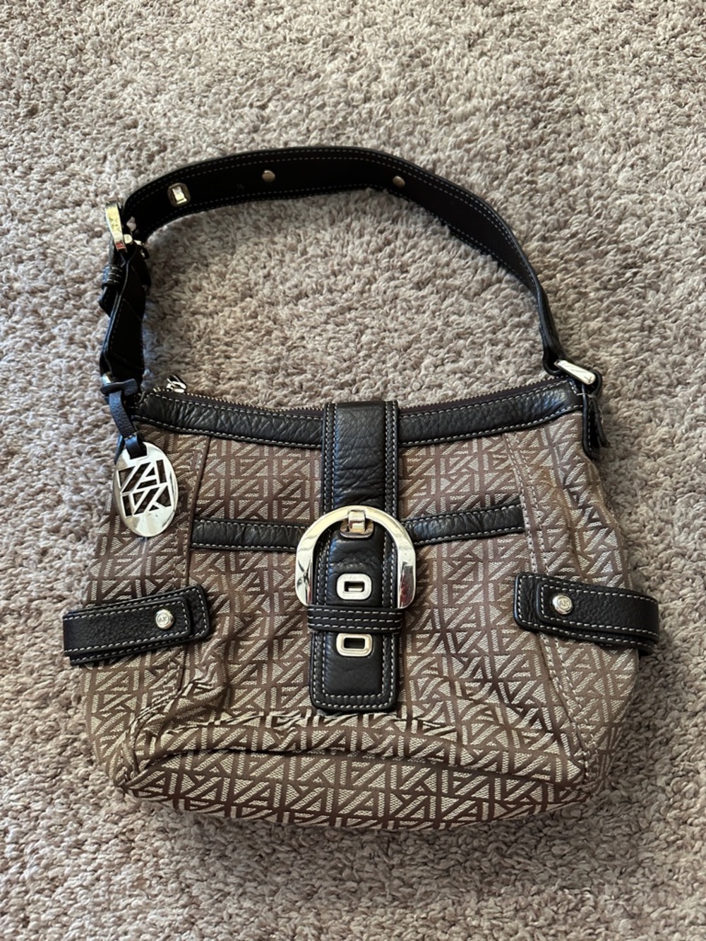 AK Anne Klein Monogram Buckle
Shoulder Bag
